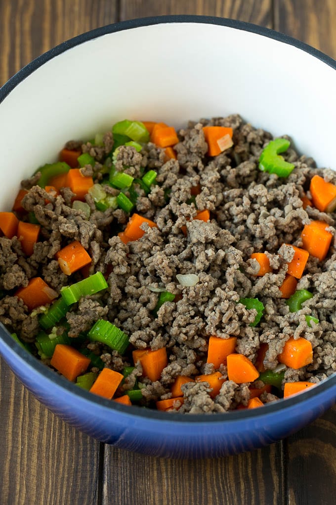 Alphabet Soup Recipe | Hamburger Soup | Beef and Vegetable Soup #soup #hamburger #noodles #dinner #sadud #carrots Ground beef, carrots, onion and celery in a soup pot.