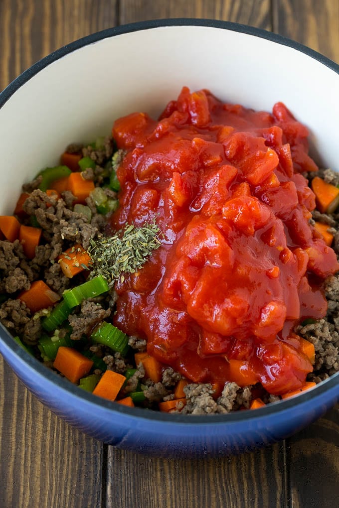 Alphabet Soup Recipe | Hamburger Soup | Beef and Vegetable Soup #soup #hamburger #noodles #dinner #sadud #carrots Ground beef, vegetables, canned tomatoes and seasonings in a pot.