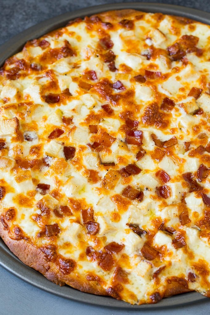 Chicken Alfredo Pizza Recipe #pizza #chicken #bacon #dinner #sadud A baked crust topped with melted cheese and meat.