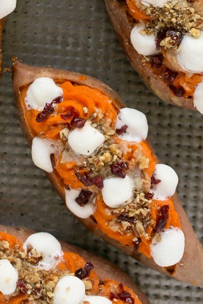 An overhead picture of loaded sweet potatoes showing off the toppings.