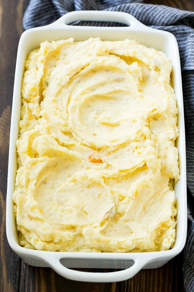 Loaded Mashed Potato Casserole Recipe | Loaded Potatoes | Bacon Mashed Potatoes | Thanksgiving Mashed Potatoes #potatoes #bacon #cheese #casserole #Thanksgiving #dinner #sadud Mashed potatoes in a baking dish.