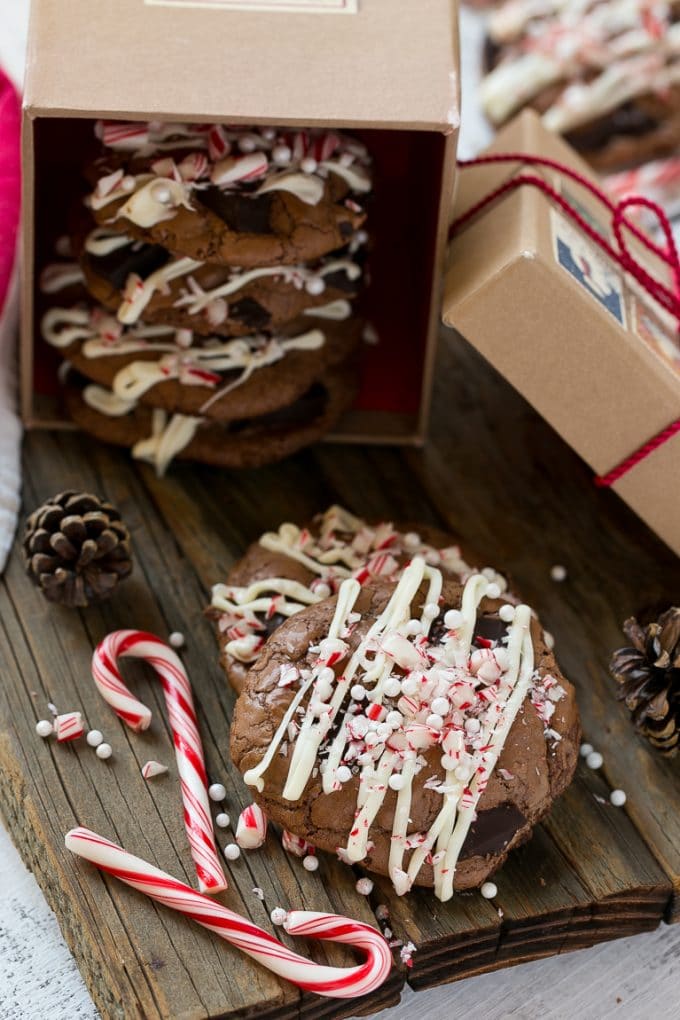 Peppermint Bark Cookie | Easy Peppermint Bark Cookies | Christmas Cookies | Peppermint Bark Cookies | Chocolate Peppermint Cookie #peppermint #peppermintbark #cookies #christmas #holiday #dessert #sadud Chocolate Peppermint Cookies topped with crushed candy canes in a gift box.