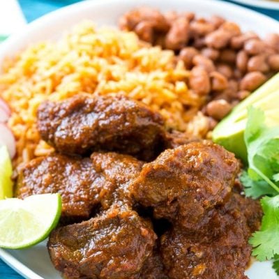 This recipe for chile colorado is a traditional Mexican dish made with tender beef that's been slow cooked in a flavorful tomato sauce. It's the perfect filling for burritos, enchiladas and tacos! #YesYouCAN ad