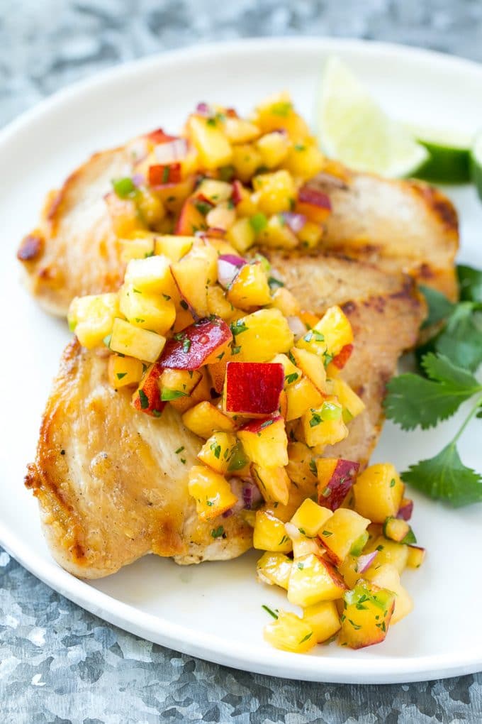Peach Salsa | Fruit Salsa #peaches #salsa #dip #appetizer #sadud Peach salsa served over grilled chicken breast.