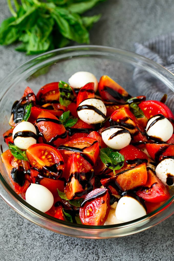 Caprese Salad Recipe | Tomato Salad #salad #tomato #mozzarella #cheese #basil #caprese #summer #sadud Caprese salad with tomatoes, fresh mozzarella, basil leaves and balsamic glaze.