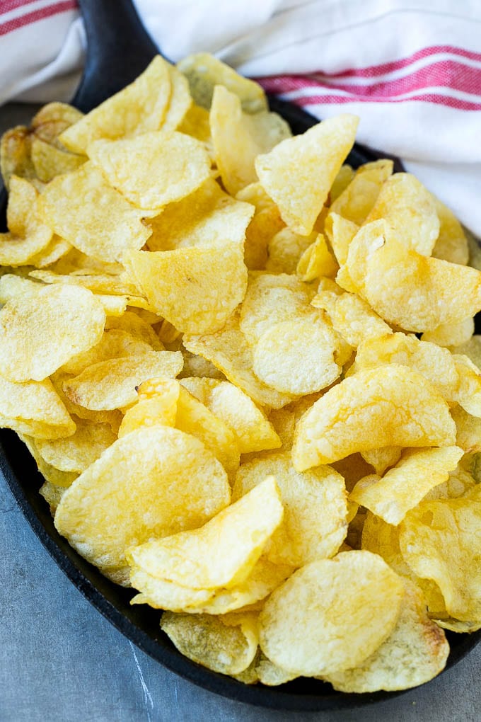 Irish Nachos Recipe | Potato Nachos | Potato Chip Recipe | Appetizer Recipe #nachos #potatoes #cheese #bacon #appetizer #sadud Kettle chips in a skillet.