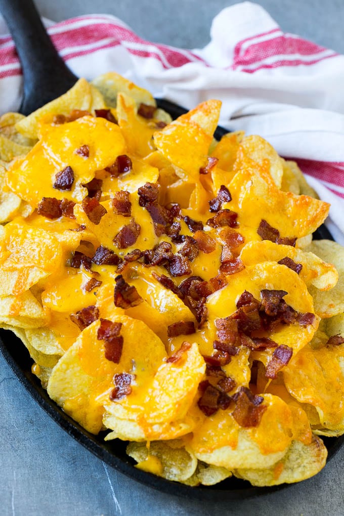 Irish Nachos Recipe | Potato Nachos | Potato Chip Recipe | Appetizer Recipe #nachos #potatoes #cheese #bacon #appetizer #sadud Potato chips topped with melted cheese and bacon.