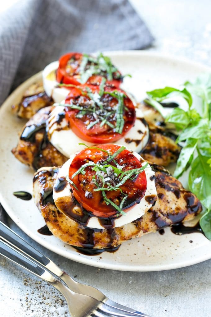 Chicken Caprese Recipe | Grilled Chicken #chicken #caprese #grilling #dinner #tomato #basil #sadud Grilled chicken breasts topped with mozzarella cheese, tomatoes and basil.