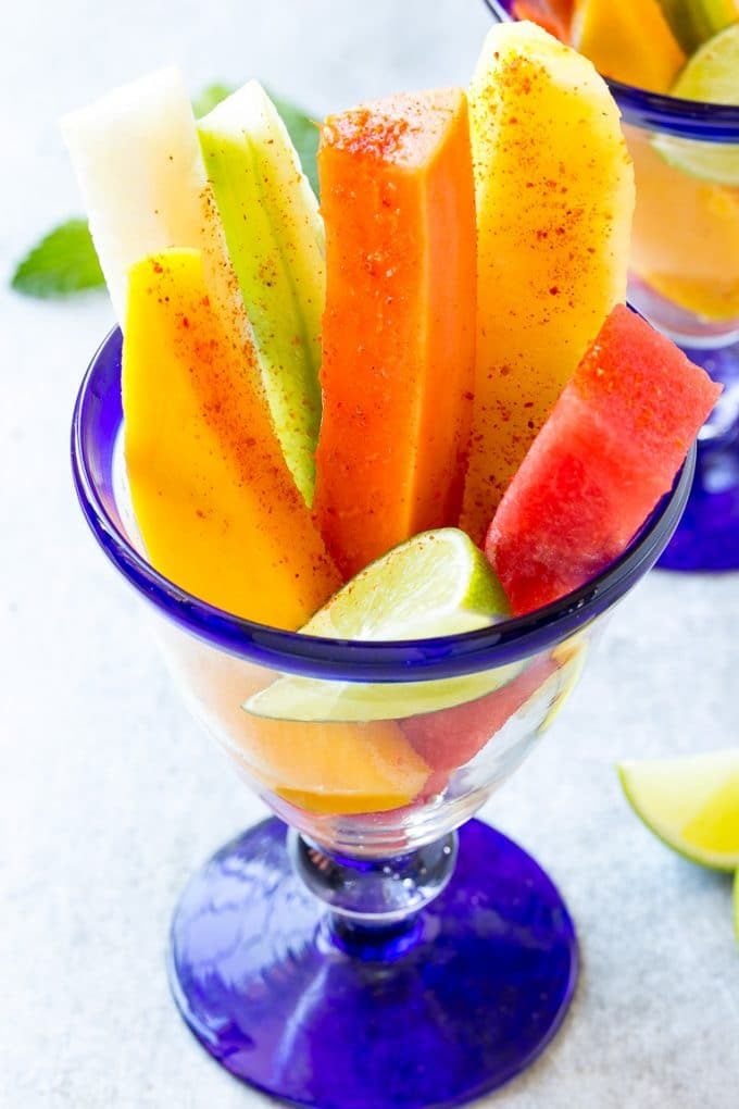 Mexican Fruit Cups | Fruit Cups | Mexican Fruit | Tropical Fruit #fruit #fruitcup #watermelon #pineapple #snack #healthy #sadud Fruit cups filled with watermelon, cucumber, papaya and mango.