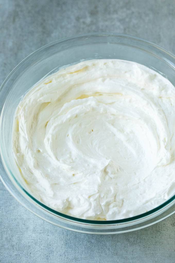Cream Cheese Fruit Dip | Fruit Recipe | Fruit Dip #fruit #dip #creamcheese #snack #dessert #sadud Cream cheese, marshmallow cream and whipped topping in a mixing bowl.