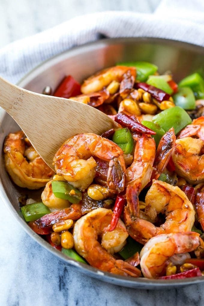 Kung Pao Shrimp | Shrimp Recipe | Shrimp Stir Fry | Easy Shrimp Recipe #shrimp #stirfry #peppers #dinner #sadud #spicy A serving spatula in a pan of Kung Pao shrimp.