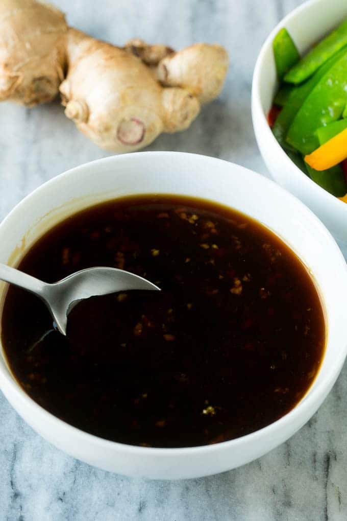 Teriyaki Shrimp Stir Fry Recipe | Shrimp Stir Fry | Healthy Stir Fry #shrimp #teriyaki #vegetables #stirfry #dinner #sadud A bowl of homemade teriyaki sauce with a spoon in it.