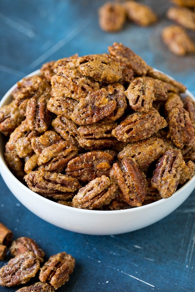 Candied Pecans Recipe | Glazed Pecans | Sugared Pecans #pecans #nuts #snack #dessert #sadud A bowl filled with homemade candied pecans.