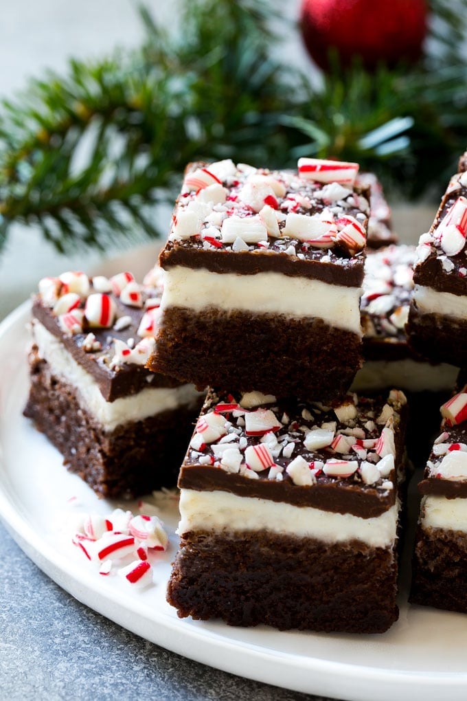 Peppermint Brownies Recipe | Holiday Brownies | Candy Cane Brownies | Mint Brownies #brownies #mint #peppermint #chocolate #dessert #christmas #sadud These easy peppermint brownies on a plate are the perfect holiday treat.