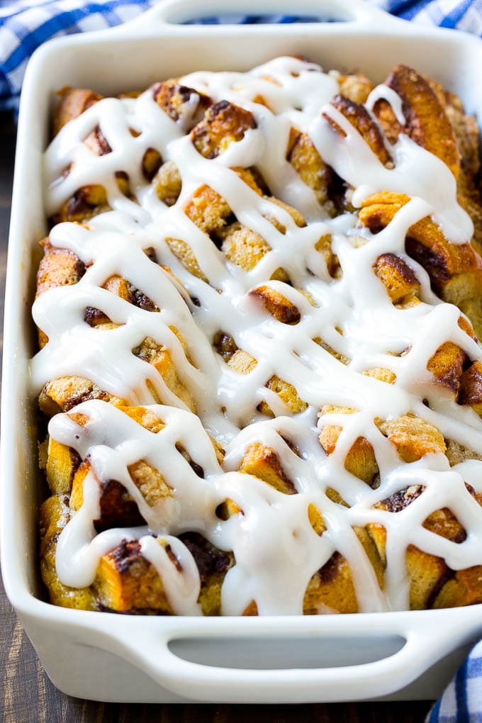 Cinnamon Roll French Toast Casserole | Cinnamon Roll French Toast Bake | Cinnamon Roll French Toast | Cinnamon French Toast #casserole #frenchtoast #cinnamonrolls #breakfast #sadud A cinnamon roll french toast casserole in a baking dish, topped with icing.