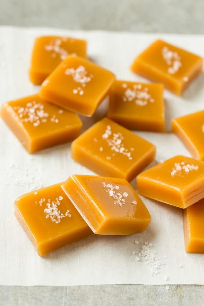 Microwave Caramels with Sea Salt Recipe | Homemade Caramels | Sea Salt Caramel | Homemade Candy #candy #caramels #caramel #microwavecaramels #homemade #dessert #sadud Squares of caramel topped with coarse salt.