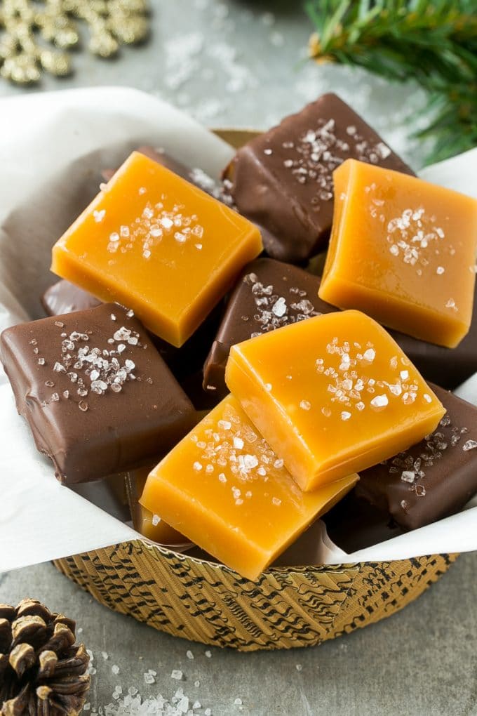 Microwave Caramels with Sea Salt Recipe | Homemade Caramels | Sea Salt Caramel | Homemade Candy #candy #caramels #caramel #microwavecaramels #homemade #dessert #sadud A basket of microwave caramels topped with sea salt.