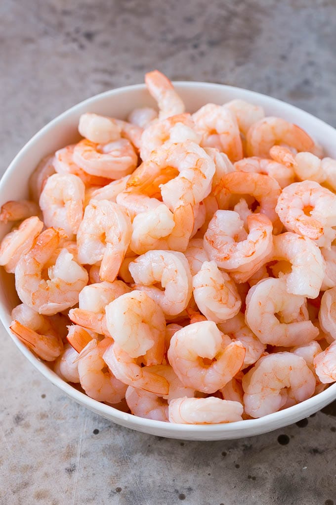 Shrimp Ceviche Recipe | Mexican Shrimp | Marinated Shrimp #shrimp #ceviche #cleaneating #healthy #lowcarb #keto #glutenfree #dinner #appetizer #sadud Cooked prawns in a serving bowl.
