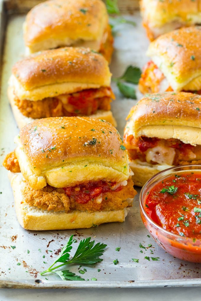 Chicken Parmesan Sliders | Chicken Parmesan Sandwich Recipe | Slider Sandwich Recipe #sliders #chickenparm #chickenparmesan #chickenparmesansliders #dinner #appetizer #sadud Chicken parmesan sliders made with crispy chicken, marinara sauce and cheese on buns.