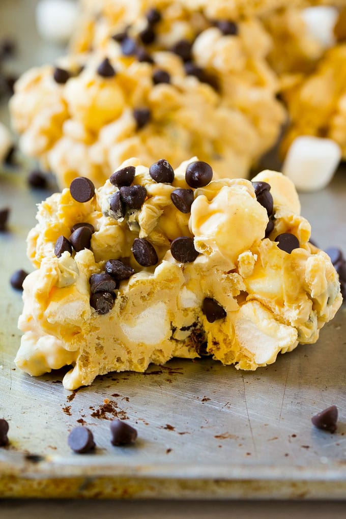 Avalanche Cookies Recipe | No Bake Cookie Recipe | Easy Cookie Recipe | Avalanche Bark #bark #avalanche #avalanchecookies #cookies #nobakecookies #nobake #dessert #sadud A close up of an avalanche cookie with a bite taken out of it.