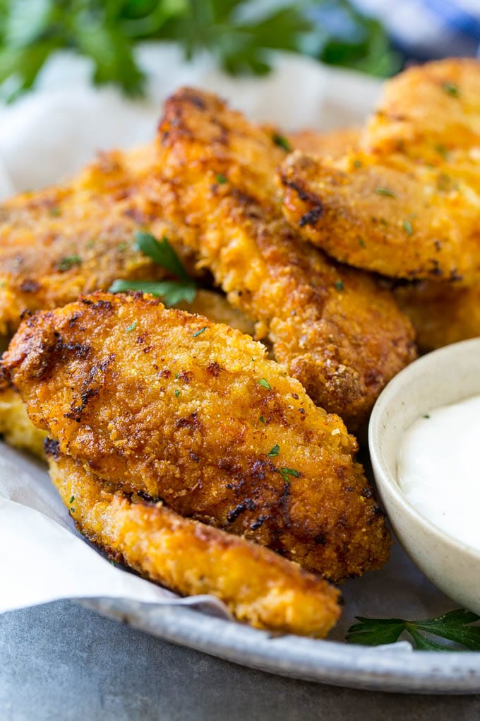 Baked Fried Chicken Recipe | Oven Fried Chicken | Baked Chicken Fingers | Crispy Chicken Fingers #chicken #friedchicken #bakedchicken #ovenfriedchicken #chickenfingers #dinner #sadud Baked oven fried chicken fingers in a dish with a side of ranch dressing.