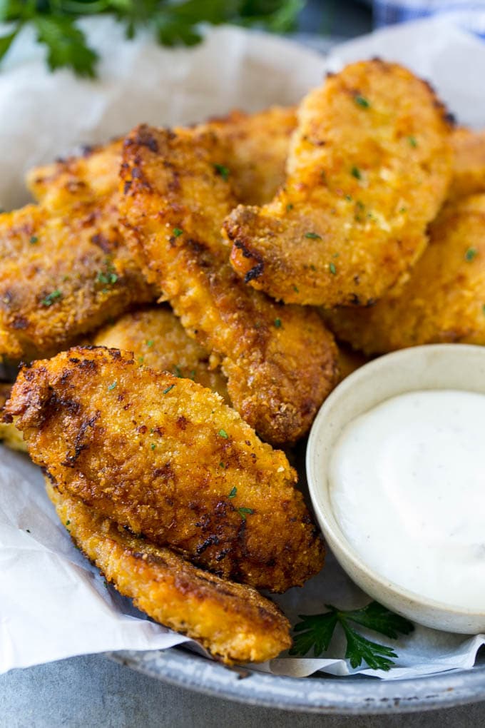Baked Fried Chicken Recipe | Oven Fried Chicken | Baked Chicken Fingers | Crispy Chicken Fingers #chicken #friedchicken #bakedchicken #ovenfriedchicken #chickenfingers #dinner #sadud Crispy baked fried chicken fingers on a plate with ranch dip.