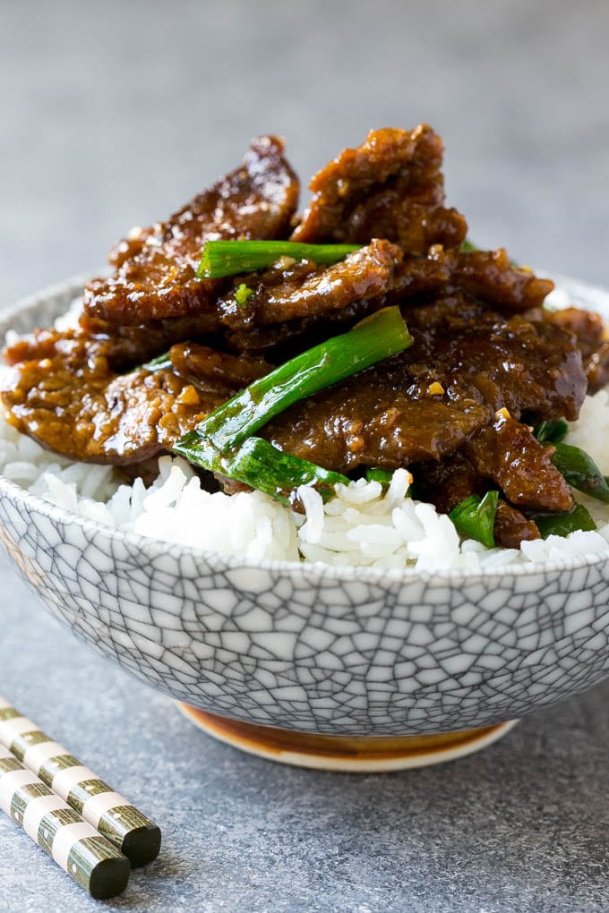Mongolian Beef Recipe | Asian Beef Recipe | Chinese Beef | Beef Stir Fry #Chinese #Mongolian #Asian #mongolianbeef #beef #sadud #dinner A bowl of mongolian beef over rice.