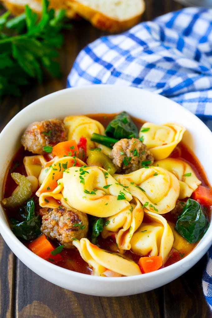 Tortellini Soup Recipe | Sausage Soup | Italian Soup #soup #sausage #pasta #tortellini #dinner #sadud A bowl of tortellini soup with sausage and vegetables.