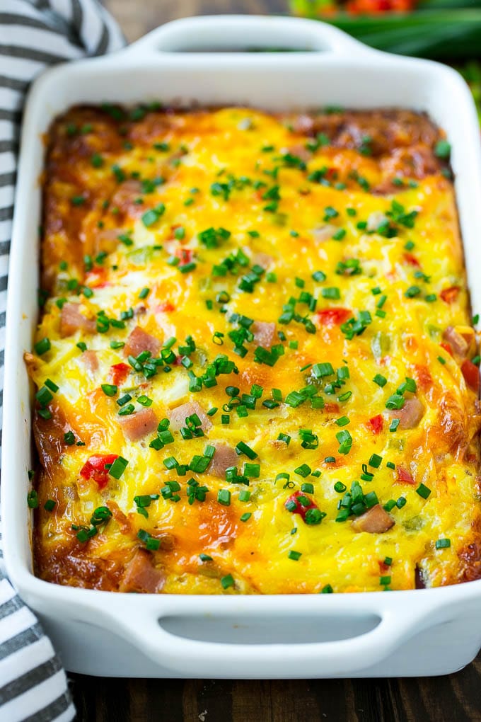 Hash Brown Egg Casserole Recipe | Breakfast Casserole with Ham | Hash Brown Casserole | Ham and Egg Casserole | Egg Casserole with Ham #casserole #breakfast #eggs #egg #hashbrown #sadud Hash brown casserole with ham, vegetables and cheese in a baking dish,