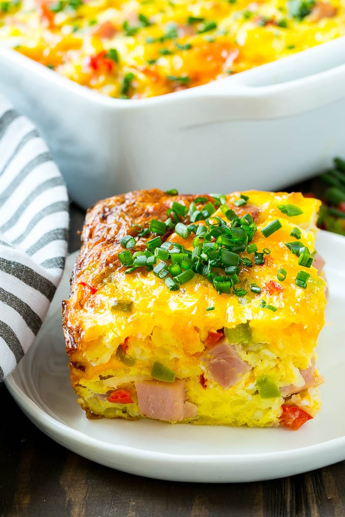Hash Brown Egg Casserole Recipe | Breakfast Casserole with Ham | Hash Brown Casserole | Ham and Egg Casserole | Egg Casserole with Ham #casserole #breakfast #eggs #egg #hashbrown #sadud A cut slice of hash brown casserole.