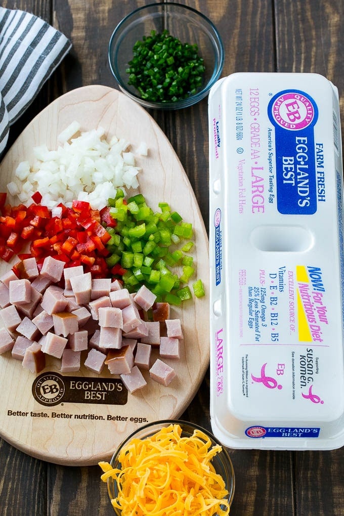 Hash Brown Egg Casserole Recipe | Breakfast Casserole with Ham | Hash Brown Casserole | Ham and Egg Casserole | Egg Casserole with Ham #casserole #breakfast #eggs #egg #hashbrown #sadud Ingredients including eggs, ham, peppers, onions and cheese.