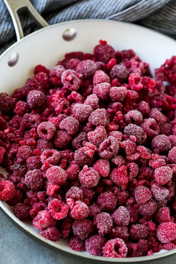 Raspberry Sauce Recipe | Homemade Raspberry Sauce | Raspberry Recipe #raspberries #dessert #sadud A pan of frozen berries.