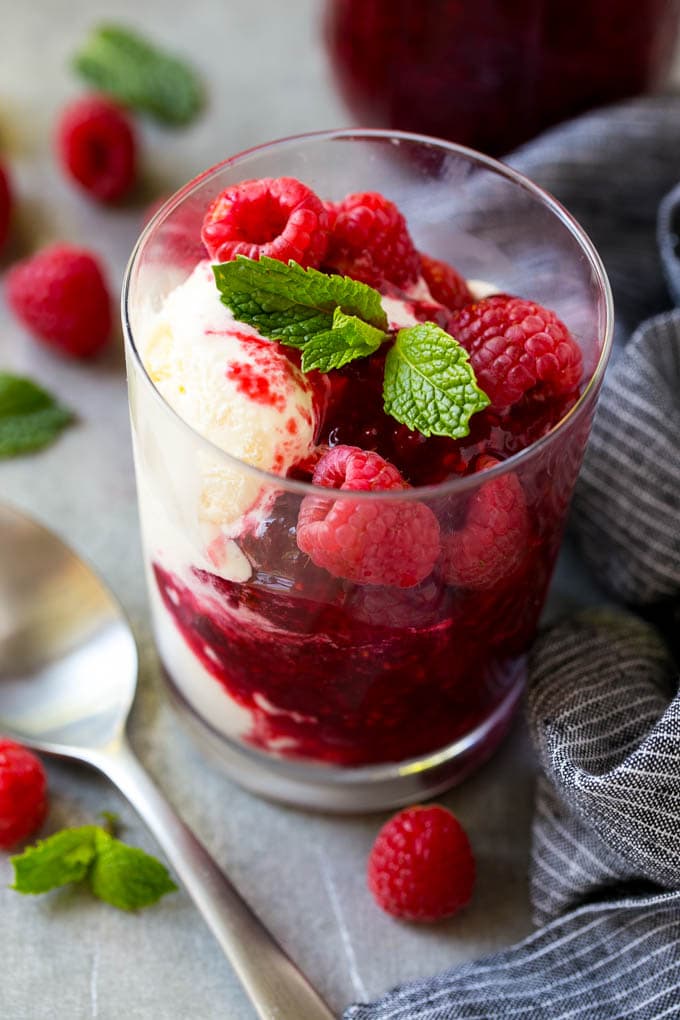 Raspberry Sauce Recipe | Homemade Raspberry Sauce | Raspberry Recipe #raspberries #dessert #sadud A cup of vanilla ice cream with raspberry sauce and fresh raspberries.