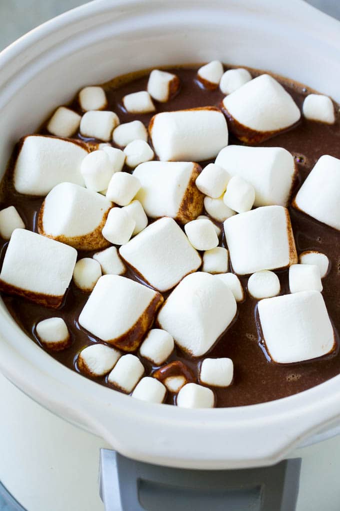 Slow Cooker Hot Chocolate Recipe | Homemade Hot Chocolate | Slow Cooker Hot Cocoa | Crock Pot Hot Chocolate #cocoa #hotchocolate #chocolate #slowcooker #crockpot #holiday #christmas #drink Slow cooker hot chocolate topped with an assortment of marshmallows.