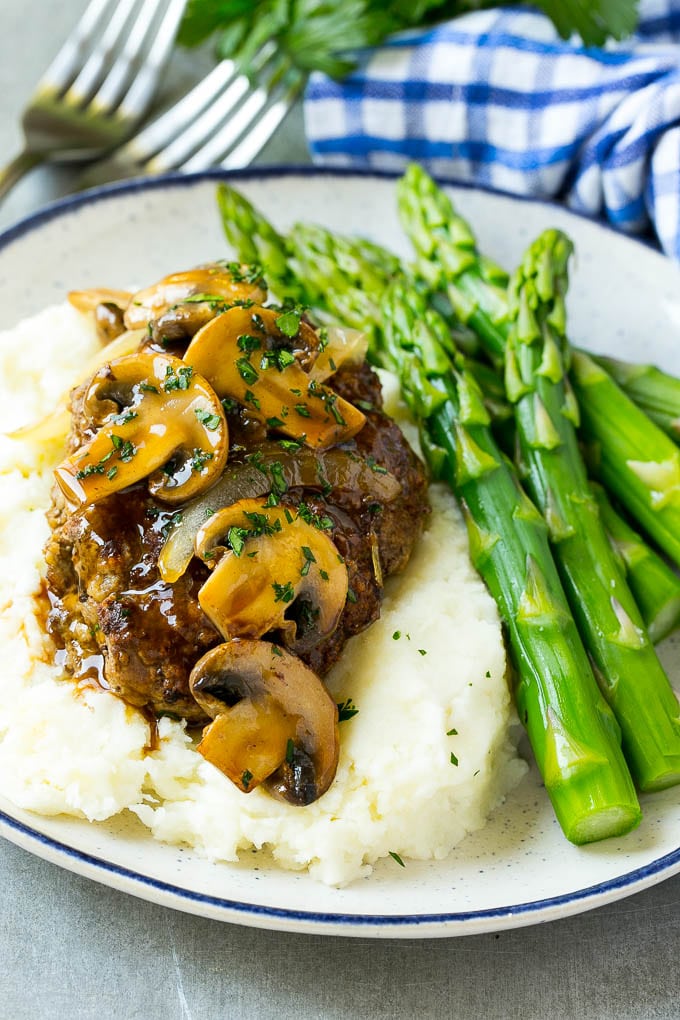 Slow Cooker Salisbury Steak Recipe | Homemade Salisbury Steak | Salisbury Steak from Scratch #steak #beef #salisbury #salisburysteak #slowcooker #crockpot #dinner #sadud Slow cooker salisbury steak with mushroom gravy over mashed potatoes.