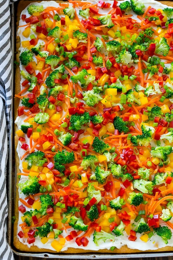 Veggie Pizza Recipe | Crescent Veggie Pizza | Vegetable Pizza Recipe | Holiday Appetizer | Homemade Veggie Pizza #pizza #veggies #vegetarian #appetizer #sadud A sheet pan of crescent veggie pizza.