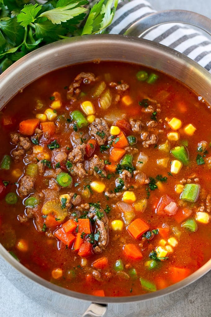 Hamburger Soup Recipe | Hamburger Stew | Ground Beef Soup #hamburger #soup #groundbeef #stew #dinner #sadud A pot of hamburger soup filled with cooked ground beef, veggies and seasonings.