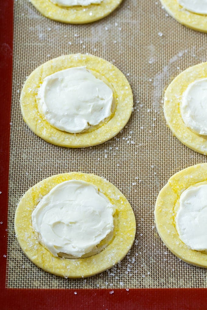 Puff pastry rounds topped with a sweet cream cheese filling.
