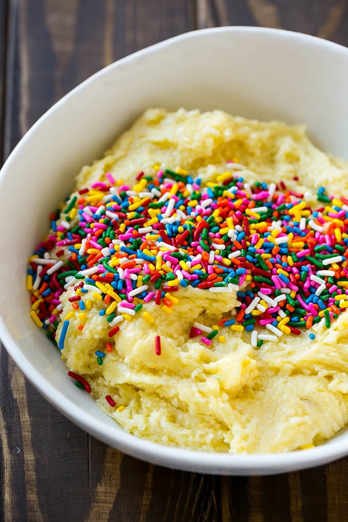 Funfetti Cookies Recipe | Funfetti Cake Mix Cookies | Sprinkle Cookies | Cake Mix Cookies #cookies #funfetti #sprinkles #dessert #sadud Cookie dough in a bowl with sprinkles on top.