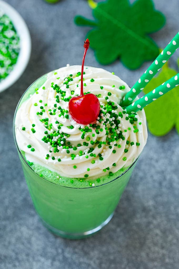 Shamrock Shake Recipe | McDonald's Shamrock Shake | Saint Patrick's Day Drink | Mint Milkshake #milkshake #stpatricksday #saintpatricksday #mint #sadud A mint Shamrock shake finished off with a swirl of whipped cream sprinkles and a cherry.