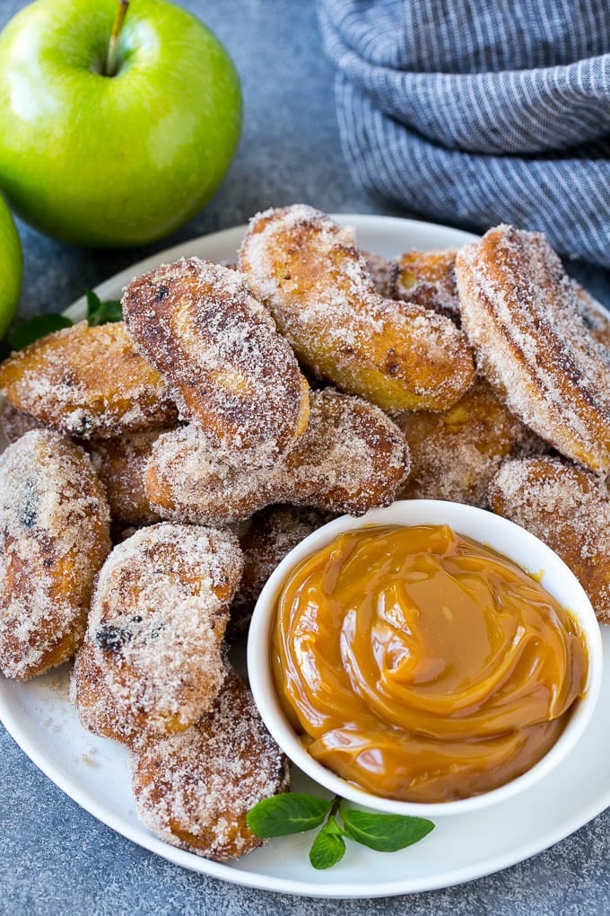 Apple Fries Recipe | Fried Apples Recipe | Cinnamon Sugar Apples | Apple Dessert Recipe #apples #dessert #sadud #fall A pile of cinnamon sugar apple fries with caramel sauce for dipping.