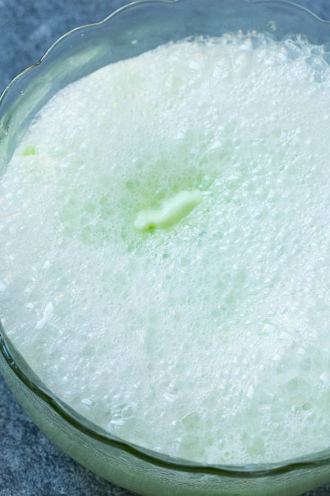 Lime Sherbet Punch | Party Punch Recipe | Sherbet Punch Recipe | Limeade Recipe #sherbet #punch #lime #drink #sadud Soda that has been poured into a large bowl.