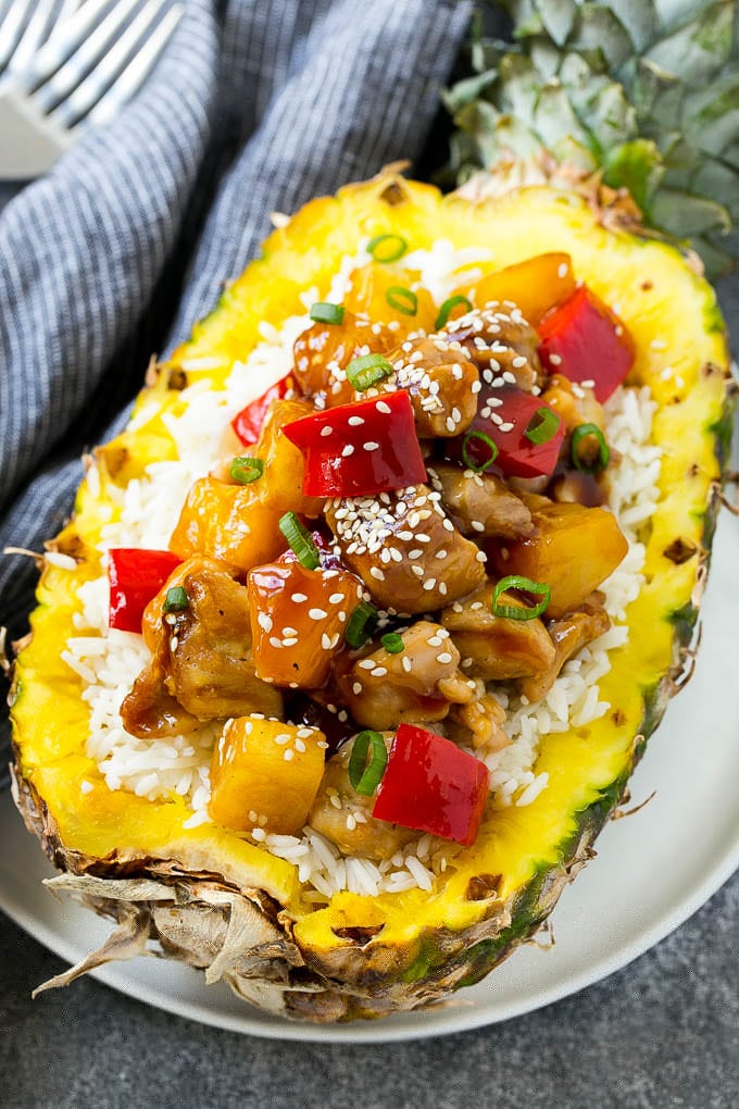 Pineapple Chicken | Hawaiian Chicken | Chicken Stir Fry #pineapple #chicken #dinner #stirfry #sadud Pineapple chicken stir fry over rice served inside half a pineapple.