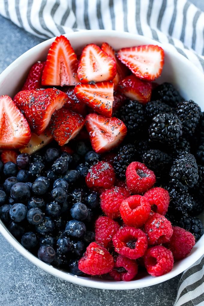 Berry Fruit Salad Recipe | Berry Salad | Summer Berry Salad | Fruit Salad Recipe #berries #fruitsalad #sadud A bowl of blueberries, raspberries, blackberries and strawberries topped with poppy seed dressing.
