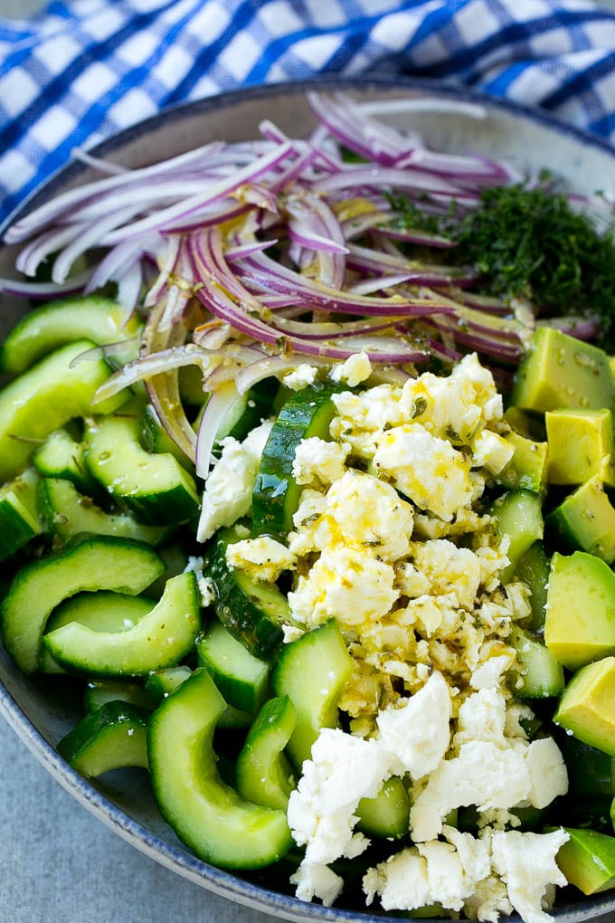 Cucumber Feta Salad Recipe | Cucumber Salad | Feta Cheese Salad | Summer Salad #salad #cucumber #sadud Veggies and cheese topped with Greek dressing.