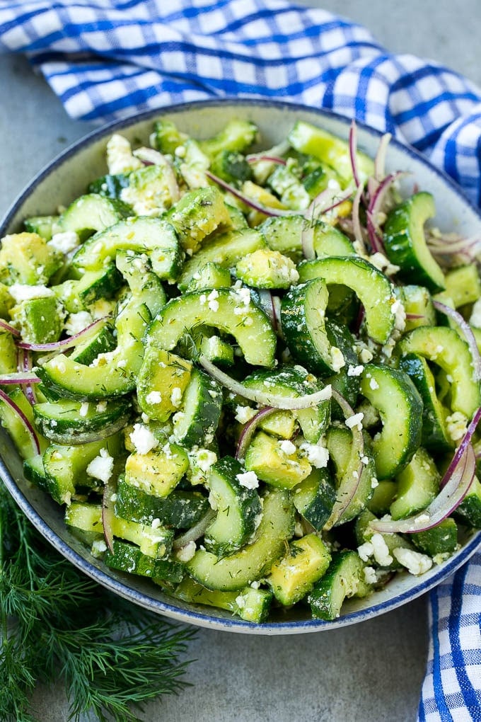 Cucumber Feta Salad Recipe | Cucumber Salad | Feta Cheese Salad | Summer Salad #salad #cucumber #sadud A bowl of cucumber feta salad with avocado.