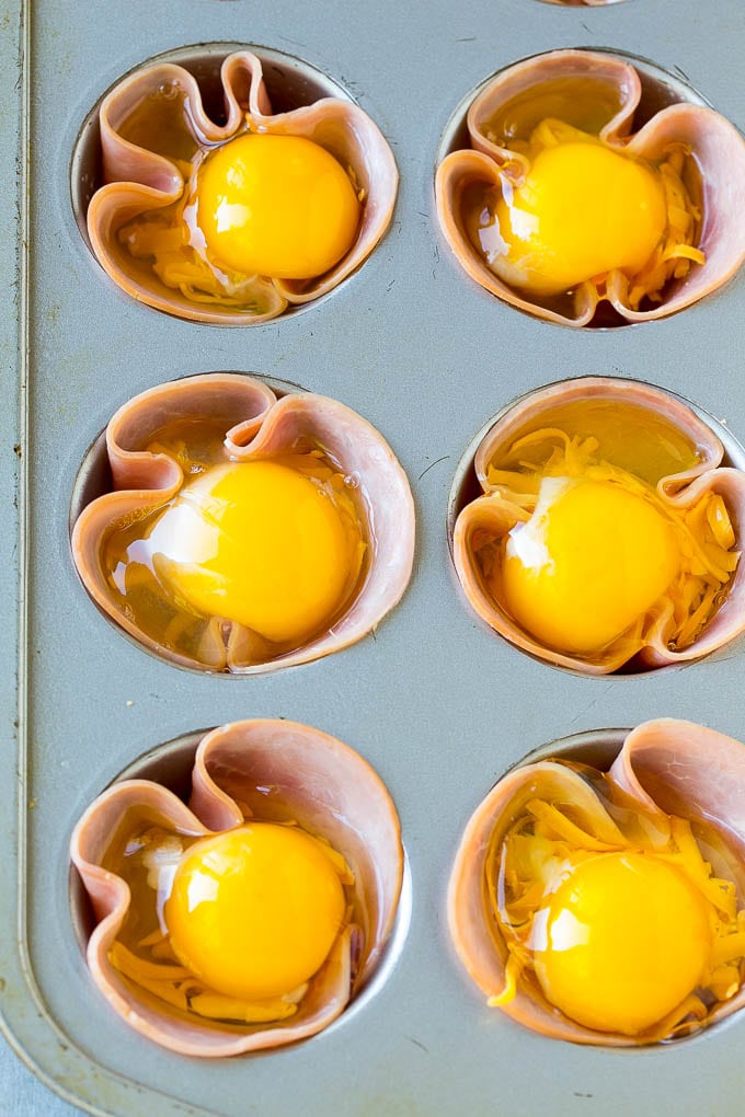 Ham and Egg Cups Recipe | Low Carb Breakfast | Ham and Eggs #ham #eggs #lowcarb #breakfast #sadud Ham pressed into muffin tins and topped with eggs and cheese.