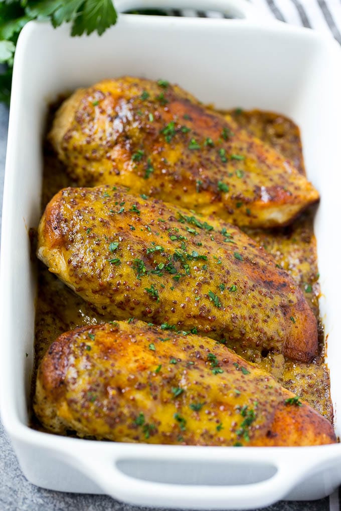 Honey Mustard Chicken Recipe | Baked Chicken Recipe | Easy Chicken Recipe #chicken #dinner #sadud Baked honey mustard chicken garnished with chopped parsley.