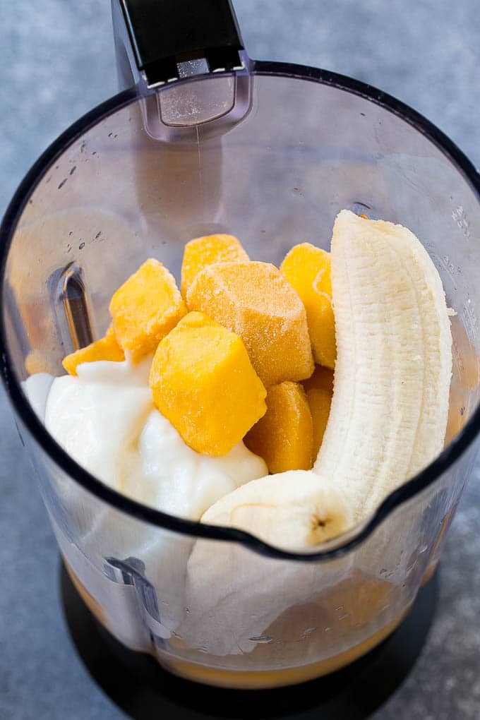 Mango Smoothie Recipe | Mango Recipe | Healthy Smoothie #mango #smoothie #drink #sadud Fruit, yogurt and juice in a blender.