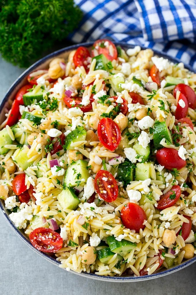 Orzo Salad Recipe | Orzo Pasta Salad | Greek Orzo Salad | Mediterranean Orzo Salad #pastasalad #orzo #greekfood #salad #sadud Greek orzo salad with pasta, cucumbers, tomatoes and feta cheese.
